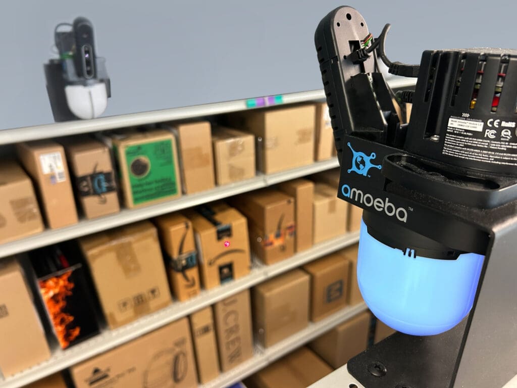 Smart Package Room standard shelving with Amoeba computer vision module tracking parcels, demonstrating how to streamline package delivery in residential buildings through precision tracking and guided pickup.